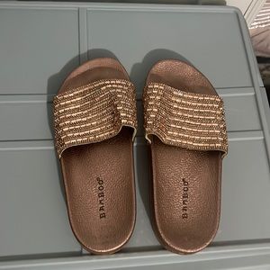 Never worn womens rose gold slides